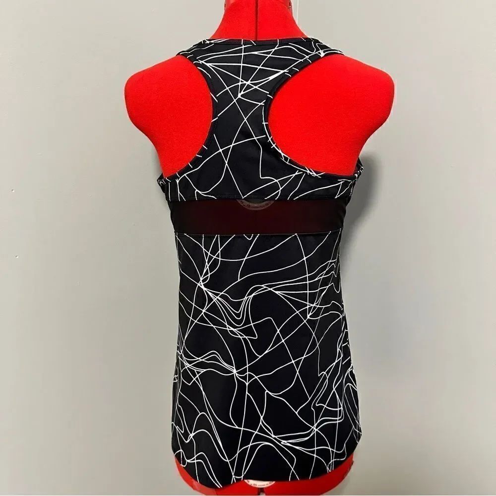 Two Fabletics workout tops. Size small. - Picture 2 of 8